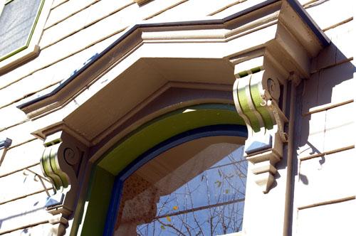 This image shows a raking view of the entablature over the doorway; City of Saint John