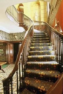 Interior view of Dundurn Castle, showing the main staircase, 1995.; Parks Canada Agency / Agence Parcs Canada, J. Butterill, 1995.