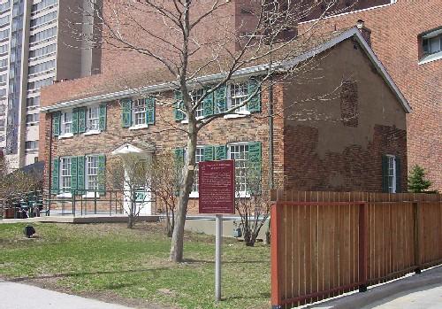 General view of François Bâby House, showing the visible brick remains of the end wall.; Parks Canada Agency / Agence Parcs Canada.