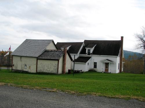 Photo of the rear of the buildings, taken at an angle; Madawaska Planning Commission