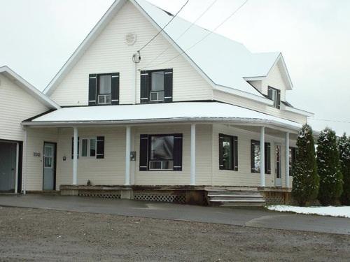 Close-up photo of the family home on the Oscar Daigle and Sons Farm; Madawaska Planning Commission