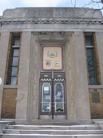 Featured are the double-leaf bronze and glass front doors, and the limestone architrave, 2007.; Lindsay Benjamin, 2007.