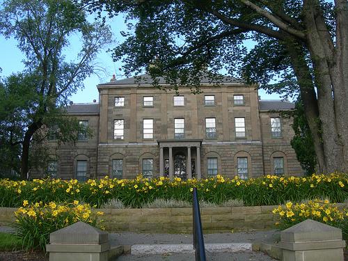 Rear view of Government House, showing the reduction in window height on each storey with rusticated arched openings on the ground floor.; Government House, Jimmy Emerson, 2010.