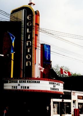 Close view of Eglinton Theatre showing the sign tower and semi-circular marquee; Agence Parcs Canada \ Parks Canada Agency, J. Mattie, 1993.