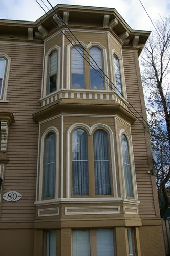 This image shows the upper storeys of Italianate bay window, 2007; City of Saint John