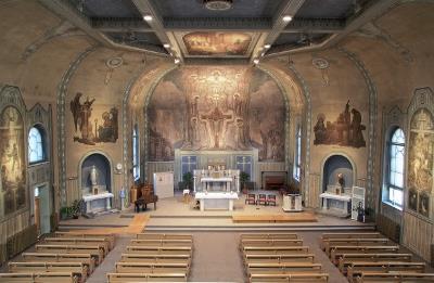 General view of Church of Notre-Dame-de-la-Présentation showing the interior decoration made by Ozias Leduc and his assistant, Gabrielle Messier.; Comité de protection des œuvres d'Ozias Leduc, Jacques Monette