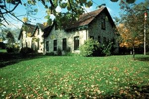 Exterior view of Woodside National Historic Site of Canada, showing the form and design of the house, as reconstructed as a replica of the original King home, 1984.; Parks Canada Agency/Agence Parcs Canada, 1984.