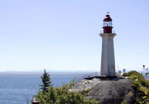 General view of Point Atkinson Lighthouse, showing its circular lantern, and platform with pronounced overhang, 2009.; Point Atkinson Lighthouse, Mandy Jansen, 2009.