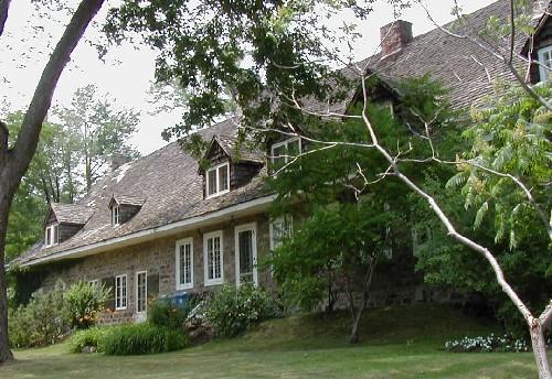 Rear view of Trestler House, showing its quarried rubblestone walls, 2001.; Parks Canada Agency / Agence Parcs Canada, 2001.