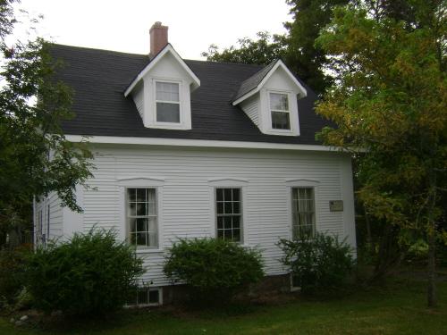 This photograph shows the front view of the building which faces the road, 2007; Town of St. Andrews