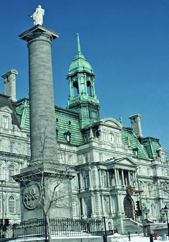 General view of Montréal City Hall showing its Second Empire style evident in the steep, metal-clad mansard roofs, 1994.; Parks Canada Agency / Agence Parcs Canada, P St. Jacques, 1994.