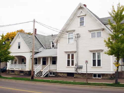 This image shows the south side of the property with the attached carriage house; Moncton Museum