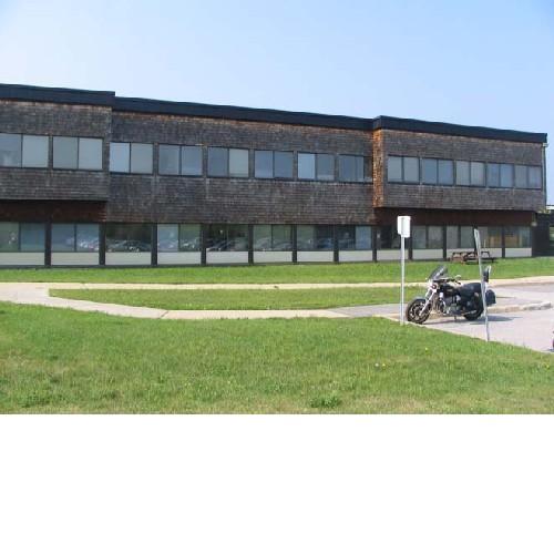 General view of Block 2200, showing the use of natural materials such as cedar shingles, 2005.; Parks Canada Agency / Agence Parcs Canada, Kate MacFarlane, 2005.