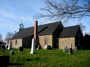 Image showing rear façade and cemetry; City of Fredericton