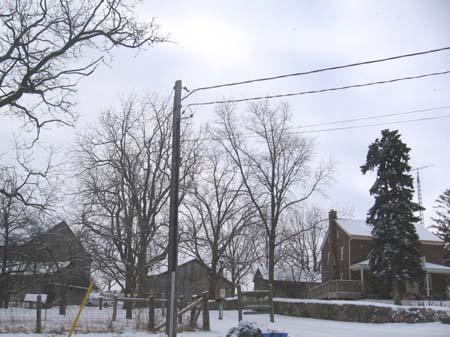 Image captures the barn, driveshed, stone outbuildings and Steckle farmhouse, 2007.; Lindsay Benjamin, 2007.