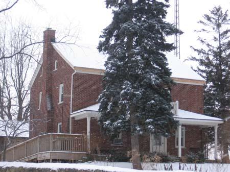 Detailed view of the north and west elevations of the main, two-storey red-brick building, 2007.; Lindsay Benjamin, 2007.