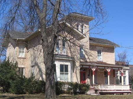 The low-hip roofline, characteristic of Italianate architecture, is portrayed in this image.; Lindsay Benjamin, 2007.