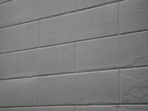 This photograph illustrates the unique plank construction that gives it a stone appearance, 2007; Town of St. Andrews