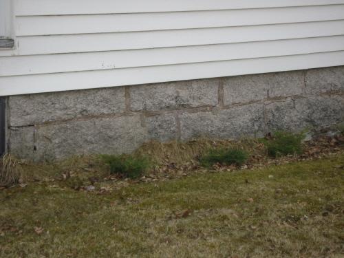 This photograph illustrates the foundation stones that were cut and laid by the original occupant, 2008; Town of St. Andrews