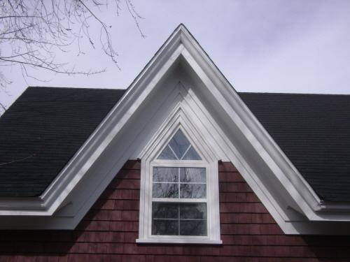 This photograph illustrates the heavy moulding within the Gothic peak, 2008; Town of St. Andrews
