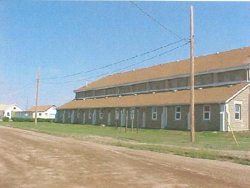 View of the exterior of the Recreational Hall, showing the roughly finished surface of the walls, 2003.; Department of National Defence / Ministère de la Défense nationale, 2003.