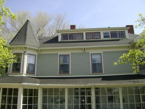 This photograph shows the bay window with semi-octagonal roof and multi-paned dormer window, 2008; Town of St. Andrews