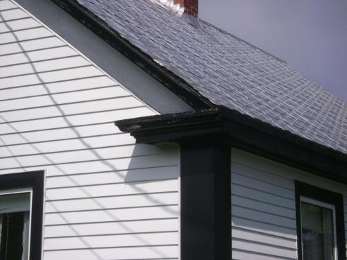 This photograph shows the eave return, 2008; Town of St. Andrews