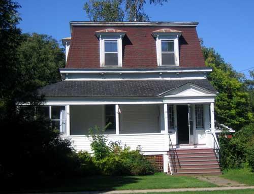 Front view showing elements of Second Empire style dwelling; City of Fredericton