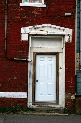 This photograph shows the entrance with entablature and transom opening , 2007; City of Saint John