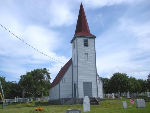 View of the left and front facades of St. John the Evangelist Anglican Church, Topsail, Conception Bay South, NL. Photo taken 2009. ; HFNL/Andrea O'Brien 2009
