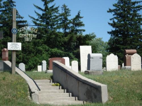 Of note is the slight rise that separates the cemetery from Colonel Talbot Road.