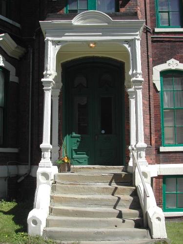 This photograph shows the west side entrance, 2007; City of Saint John
