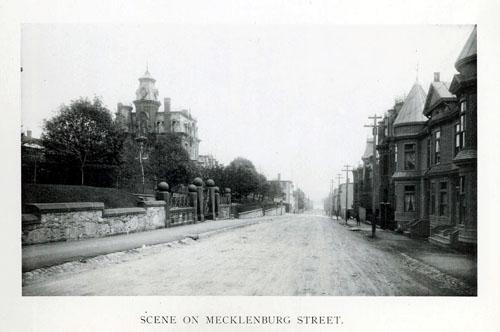Historic image from "Art Work on City of Saint John, New Brunswick" by William H. Carre, 1899. John Magee Residence on the left side of the photograph.; New Brunswick Museum, Saint John, NB
