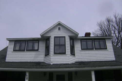 This photograph shows the elongated shed dormer, 2009; Town of St. Andrews