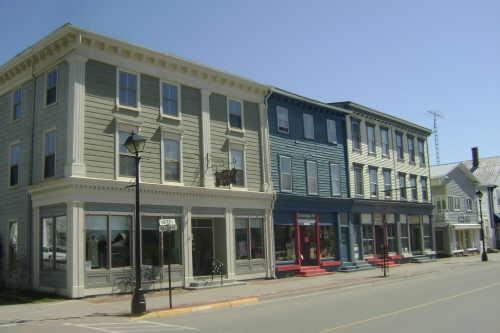 This photograph shows the Berry Building in the forefront and neighbouring buildings along the Church Street block; Town of St. Andrews