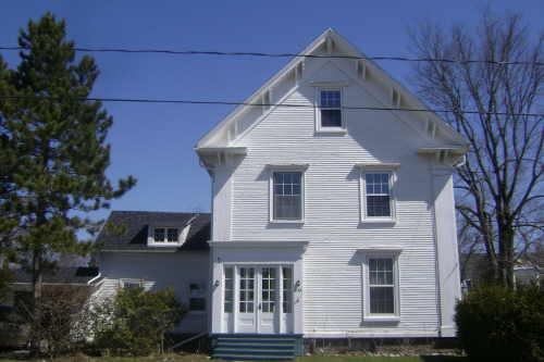 This photograph shows the front façade of the residence, 2009; Town of St. Andrews