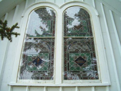 Window detail, east elevation, St. Peter's and St. John's, Baddeck, Nova Scotia, 2004.
; Heritage Division, NS Dept. of Tourism, Culture and Heritage, 2004.