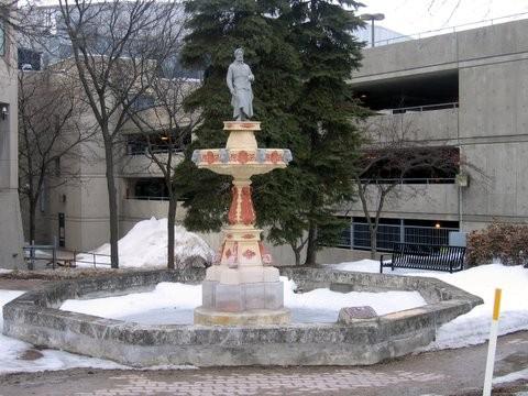 Featured is the statue supported above a Rococo-style pedestal and base.; Mary Tivy, 2008.