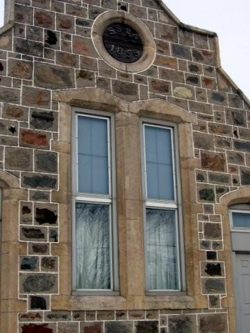 Featured are the tall, narrow central 4 over 4 windows.; Mary Tivy, 2008.