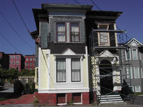 This photograph shows the contextual view of the building as it was undergoing a renovation project, 2007; City of Saint John