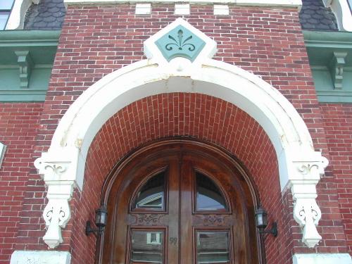 This photograph shows the entrance moulding and the arched portico, 2007; City of Saint John