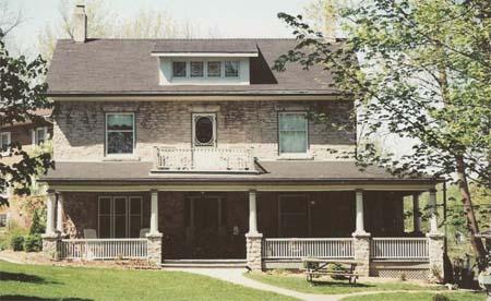 Of note is the symmetrical two-storey facade and full wrap-around veranda.; Gord Strathdee, 2007.