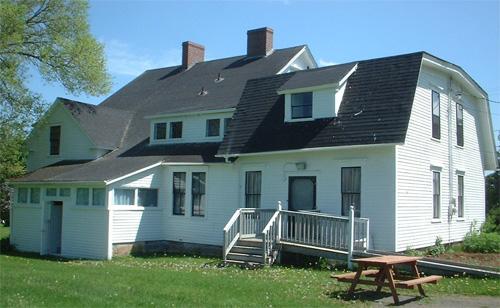Back yard view of the building.; Province of New Brunswick, Heritage Branch