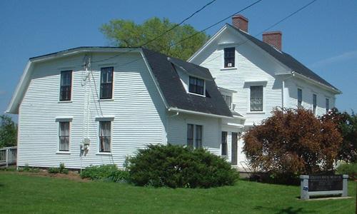 View of building from Mill Street arrival point.; Province of New Brunswick, Heritage Branch