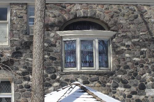 Featured is the leaded bay window with stained glass inset above.; Paul Dubniak, 2008.