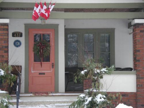 Of note are the covered front entrance and brick piers.; Kayla Jonas, 2008.