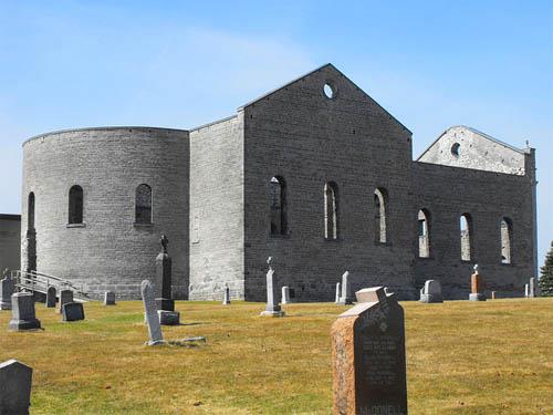 General view of the Ruin of St. Raphael's Roman Catholic Church showing the physical relationship and viewscapes between the ruin and its surrounding historic elements within the ecclesiastical precinct that include the burial ground, 2009.; Flickr, guidedbycthulhu, 2009.