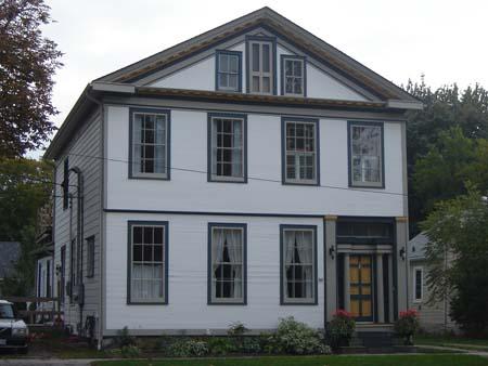 Of note is the pediment on the central gable.; Kayla Jonas, 2007.