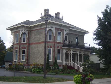 Of note is the front veranda with scrollwork and iron cresting.; Kayla Jonas, 2007.