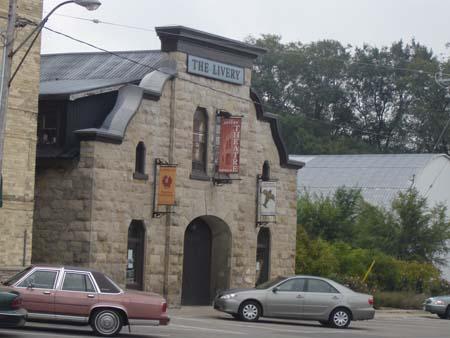 Of note are the parapet and unusually-shaped gable roof.; Kayla Jonas, 2007.
